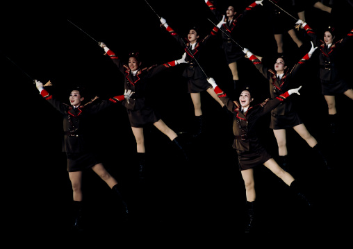 Sexy North Korean women dressed as soldiers dancing with swords during the Arirang mass games in may day stadium, Pyongan Province, Pyongyang, North Korea