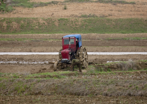 Old North Korean tractor in a field in the countryside, Pyongan Province, Myohyang-san, North Korea