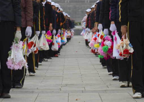 Young North Korean women during a mass games rehearsal in Kim il Sung square, Pyongan Province, Pyongyang, North Korea