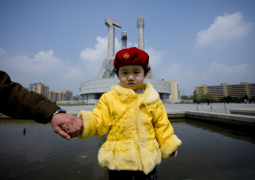 North Korean father and daughter near the monument to the foundation of the workers' Party, Pyongan Province, Pyongyang, North Korea