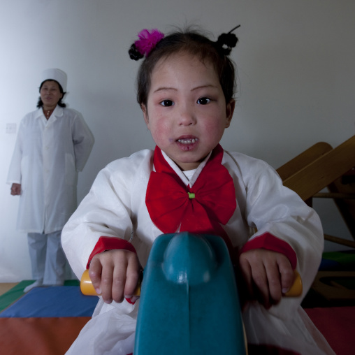 North Korean girl dressed in choson-ot in an orphanage, South Pyongan Province, Nampo, North Korea