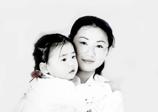 North Korean girl and a nurse in an orphanage, South Pyongan Province, Nampo, North Korea