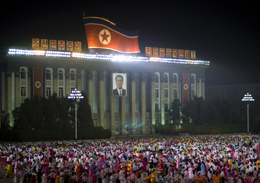 North Korean students dancing to celebrate april 15 the birth anniversary of Kim Il-sung on Kim il Sung square, Pyongan Province, Pyongyang, North Korea
