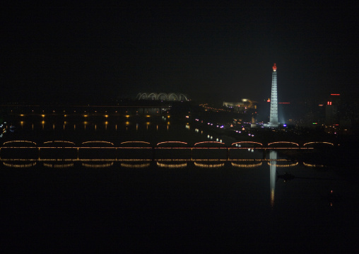 View of the Juche tower and Taedong river at night, Pyongan Province, Pyongyang, North Korea