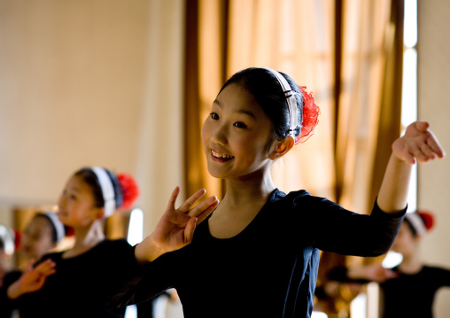 North Korean schoolgirls attend a dance class at the Mangyongdae children's palace, Pyongan Province, Pyongyang, North Korea
