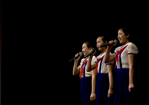 North Korean pioneers girls singing in Mangyongdae children's palace, Pyongan Province, Pyongyang, North Korea