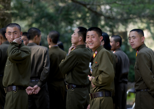 Smiling North Korean soldiers in the street, Hyangsan county, Mount Myohyang, North Korea