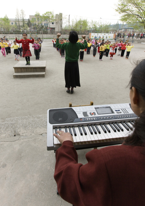 North Korean children making morning gymnastics at school, Pyongan Province, Pyongyang, North Korea
