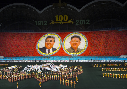 Kim il Sung and Kim Jong il portraits made by children pixels holding up colored boards during Arirang mass games in may day stadium, Pyongan Province, Pyongyang, North Korea