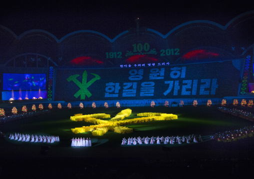 Panoramic view of the Arirang mass games with North Korean performers and the workers' Party of North Korea logo in may day stadium, Pyongan Province, Pyongyang, North Korea