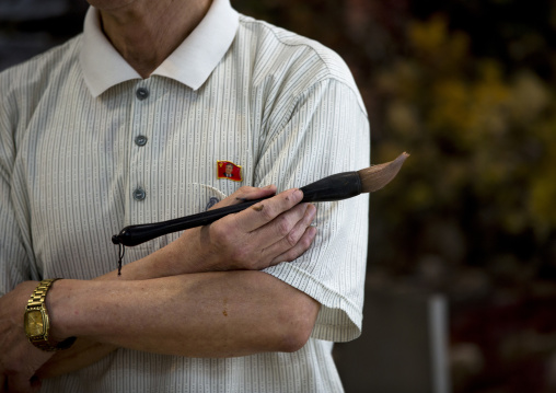 North Korean state artist in his workshop at Mansudae art studio, Pyongan Province, Pyongyang, North Korea