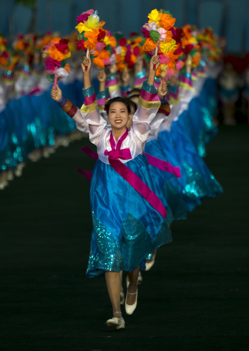 North Korean women dancing in choson-ot during the Arirang mass games in may day stadium, Pyongan Province, Pyongyang, North Korea