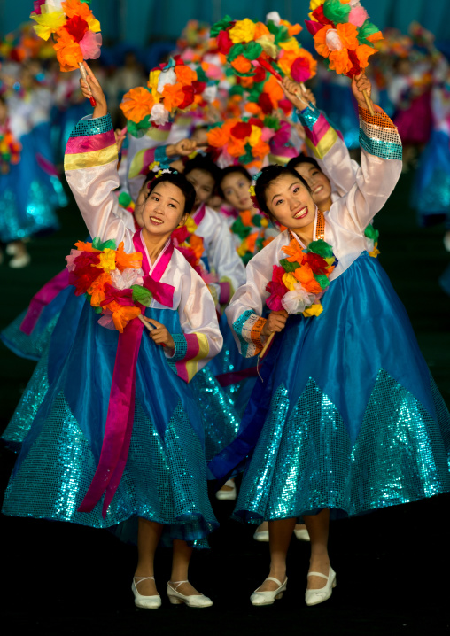 North Korean women dancing in choson-ot during the Arirang mass games in may day stadium, Pyongan Province, Pyongyang, North Korea