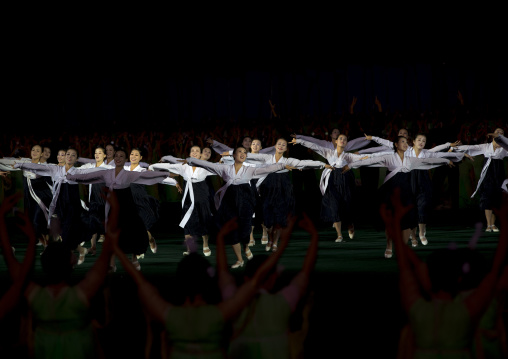 North Korean women dancing in choson-ot during the Arirang mass games in may day stadium, Pyongan Province, Pyongyang, North Korea