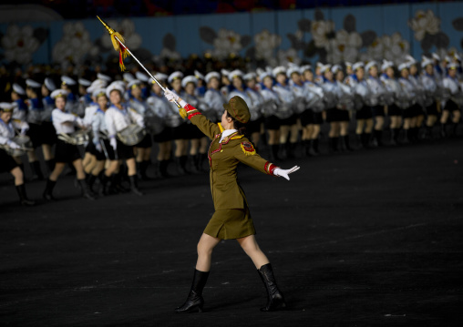 Sexy North Korean women dressed as soldiers dancing with swords during the Arirang mass games in may day stadium, Pyongan Province, Pyongyang, North Korea