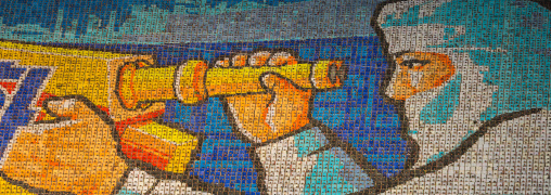 North Korean scientist made by children pixels holding up colored boards during Arirang mass games in may day stadium, Pyongan Province, Pyongyang, North Korea