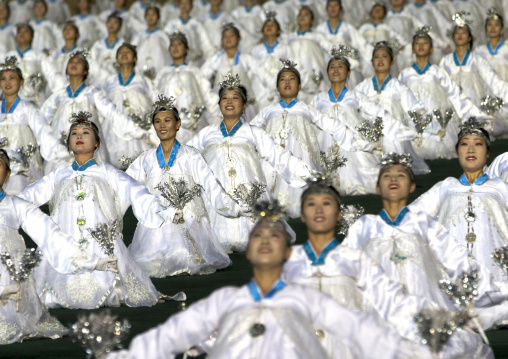 North Korean women dancing in choson-ot during the Arirang mass games in may day stadium, Pyongan Province, Pyongyang, North Korea
