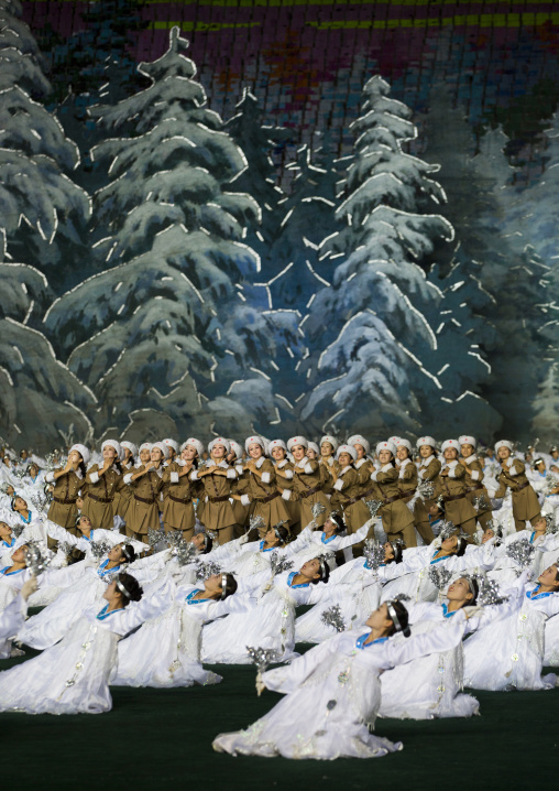 North Korean women dressed as soldiers and dancers in a forest during the Arirang mass games at may day stadium, Pyongan Province, Pyongyang, North Korea