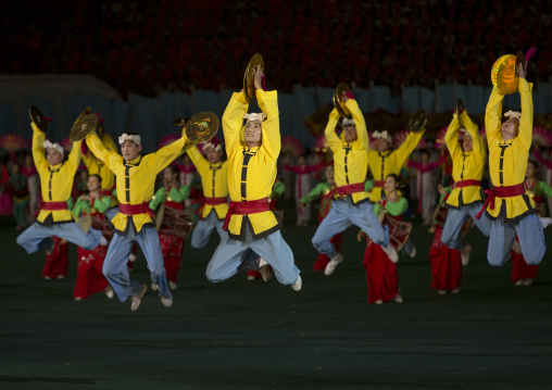 North Korean acrobats jumping at Arirang mass games in may day stadium, Pyongan Province, Pyongyang, North Korea