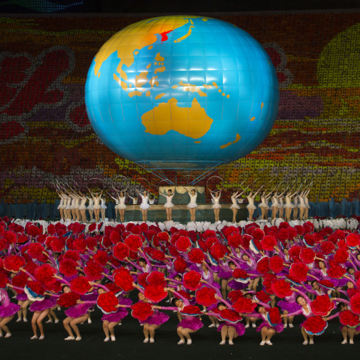 North Korean gymnasts in front of a world globe during the Arirang mass games in may day stadium, Pyongan Province, Pyongyang, North Korea