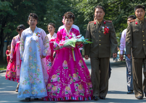 Newly wed couple in the Grand monument on Mansu hill, Pyongan Province, Pyongyang, North Korea