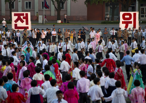 North Korean students during a mass dance performance on september 9 day of the foundation of the republic, Pyongan Province, Pyongyang, North Korea