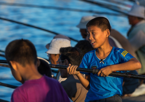 North Korean men fishing in the port, Kangwon Province, Wonsan, North Korea