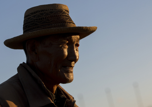Portrait of a North Korean man with a hat, Kangwon Province, Wonsan, North Korea