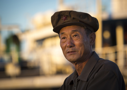 Portrait of a North Korean man with a cap, Kangwon Province, Wonsan, North Korea