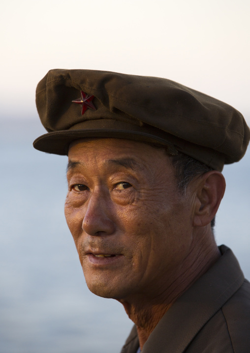 Portrait of a North Korean man with a cap, Kangwon Province, Wonsan, North Korea