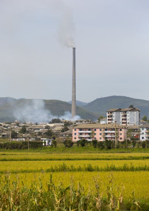 Giant factory chimney in a village, South Hamgyong Province, Hamhung, North Korea