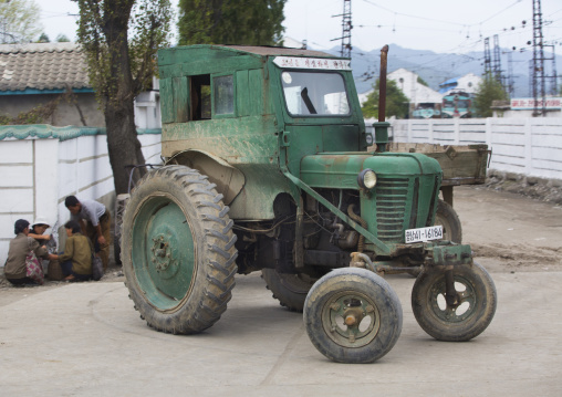 Old green North Korean tractor in the countryside, South Hamgyong Province, Hamhung, North Korea