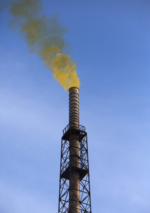 Yellow smoke coming out of a chimney in Hungnam nitrogen fertilizer plant, South Hamgyong Province, Hamhung, North Korea