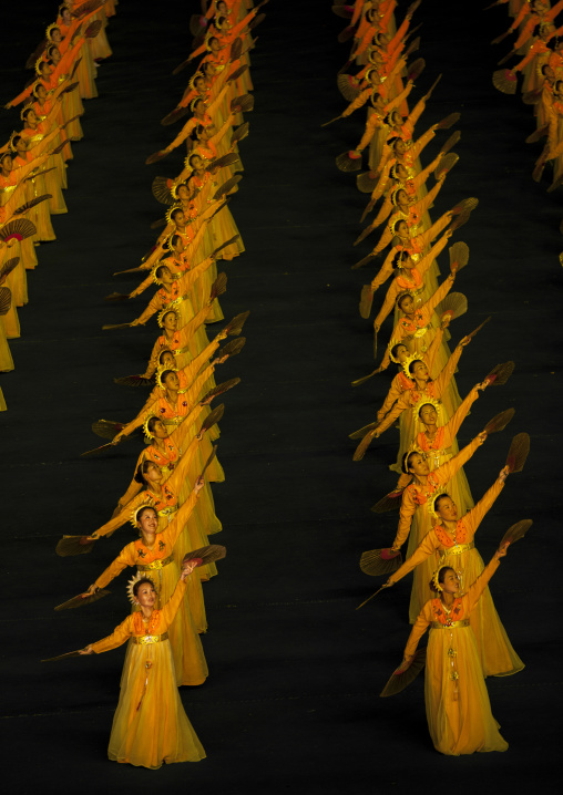 North Korean women dancing in choson-ot during the Arirang mass games in may day stadium, Pyongan Province, Pyongyang, North Korea