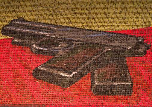 Kim il Sung pistol made by children pixels holding up colored boards during Arirang mass games in may day stadium, Pyongan Province, Pyongyang, North Korea