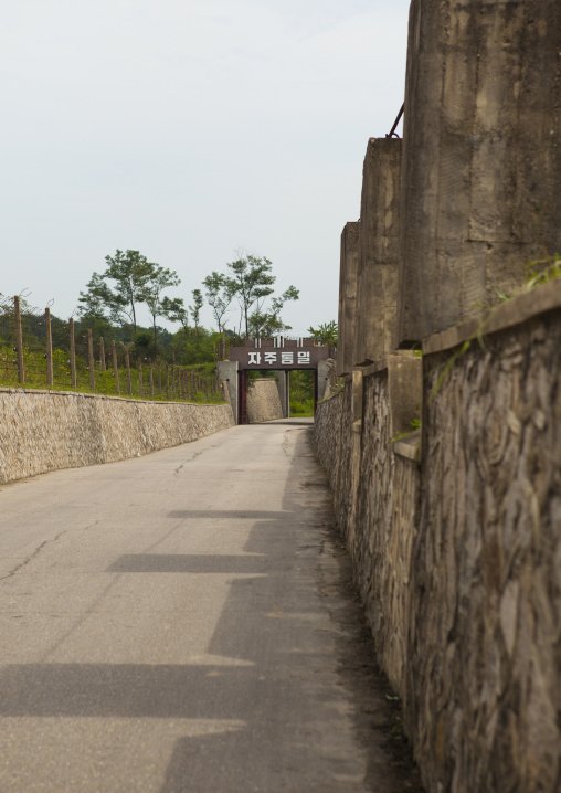 North Korean anti tank invasion concrete blocks on the roadside on the Demilitarized Zone, North Hwanghae Province, Panmunjom, North Korea