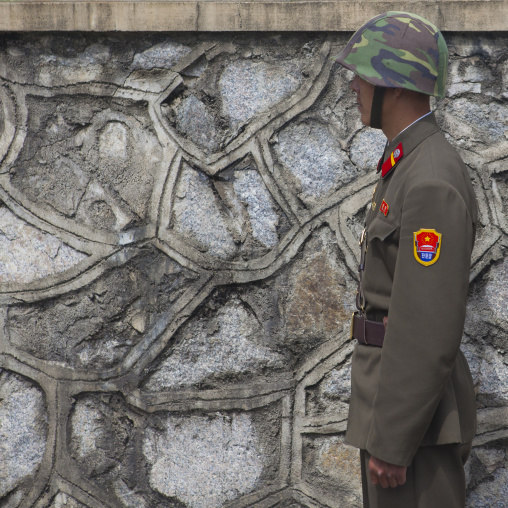 North Korean soldier wearing an helmet in the joint security area of the Demilitarized Zone, North Hwanghae Province, Panmunjom, North Korea