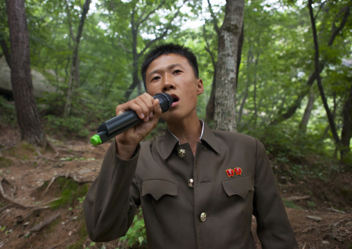North Korean soldier singing in a park, North Hwanghae Province, Kaesong, North Korea