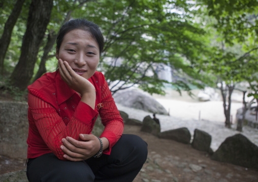 North Korean woman resting in a park, North Hwanghae Province, Kaesong, North Korea