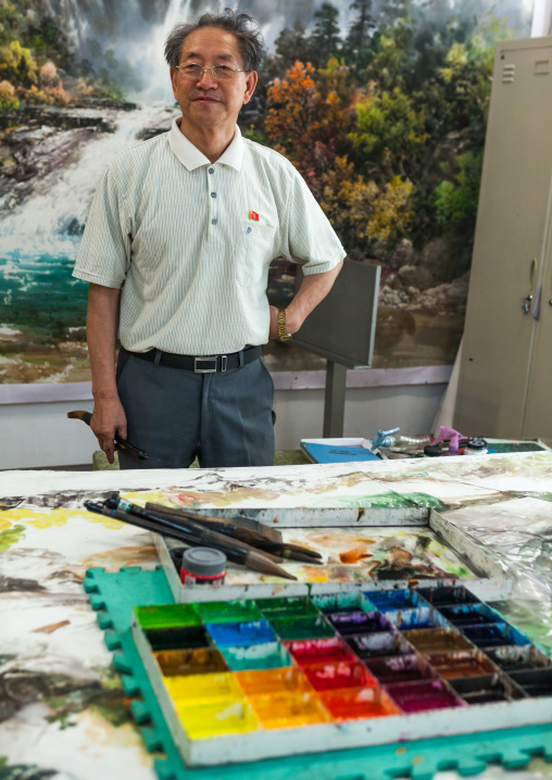 North Korean state artist in his workshop at Mansudae art studio, Pyongan Province, Pyongyang, North Korea
