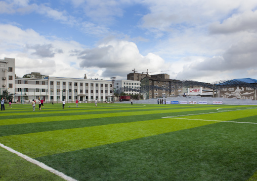 Women playing football on artificial grass turf, Pyongan Province, Pyongyang, North Korea
