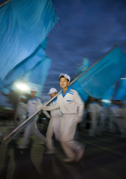 North Korean gymnasts with blue flags during the Arirang mass games in may day stadium, Pyongan Province, Pyongyang, North Korea