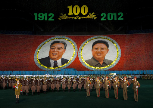 Kim il Sung and Kim Jong il portraits made by children pixels holding up colored boards during Arirang mass games in may day stadium, Pyongan Province, Pyongyang, North Korea
