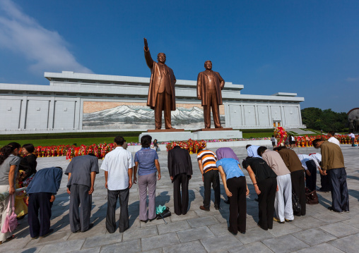 North Korean people paying respect to the Leaders statues in Mansudae Grand monument, Pyongan Province, Pyongyang, North Korea