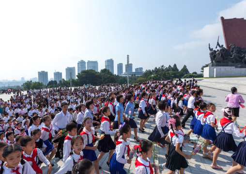 North Korean pioneers from the Korean children's union in the Grand monument on Mansu hill, Pyongan Province, Pyongyang, North Korea