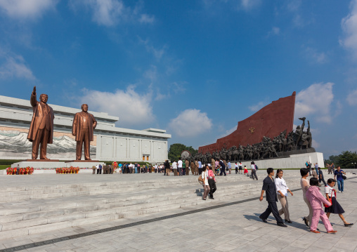 North Korean people in front of the statues of the Dear Leaders in Mansudae Grand monument, Pyongan Province, Pyongyang, North Korea