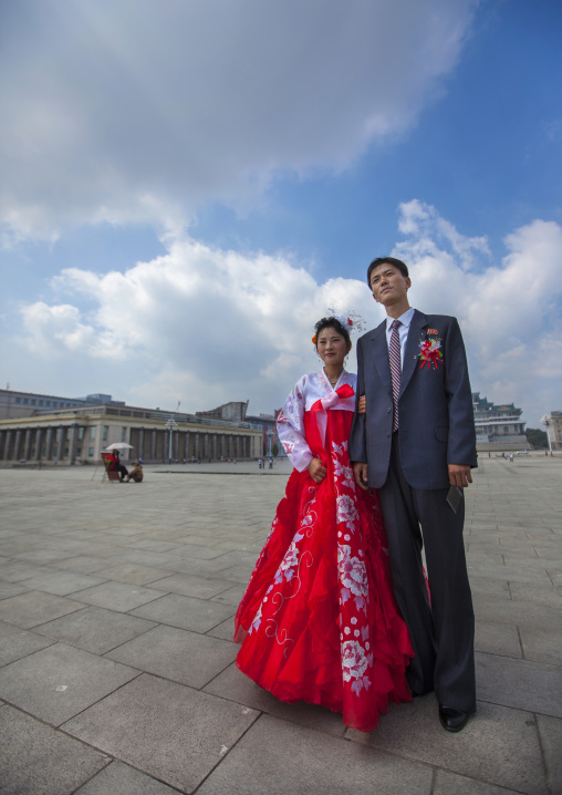 North Korean couple newly wed in Kim il Sung square, Pyongan Province, Pyongyang, North Korea