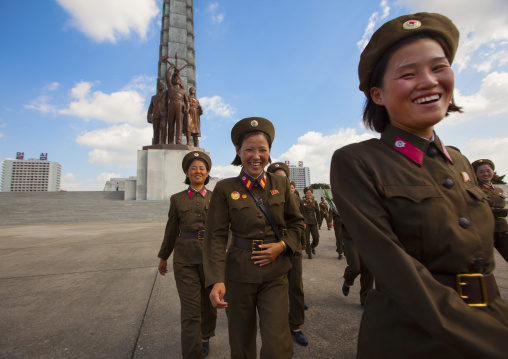 Smiling North Korean female soldiers in Juche tower, Pyongan Province, Pyongyang, North Korea