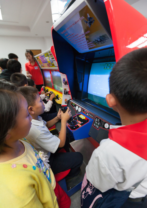 North Korean child on a car simulator in Kaeson youth park, Pyongan Province, Pyongyang, North Korea