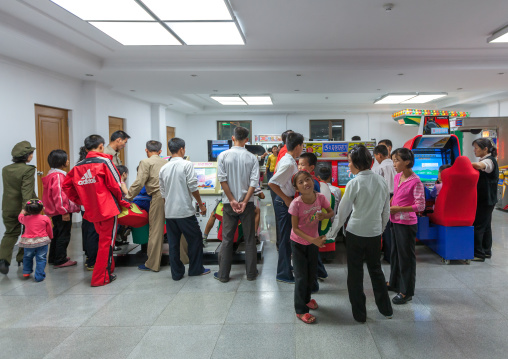 North Korean people playing video games in Kaeson youth park, Pyongan Province, Pyongyang, North Korea